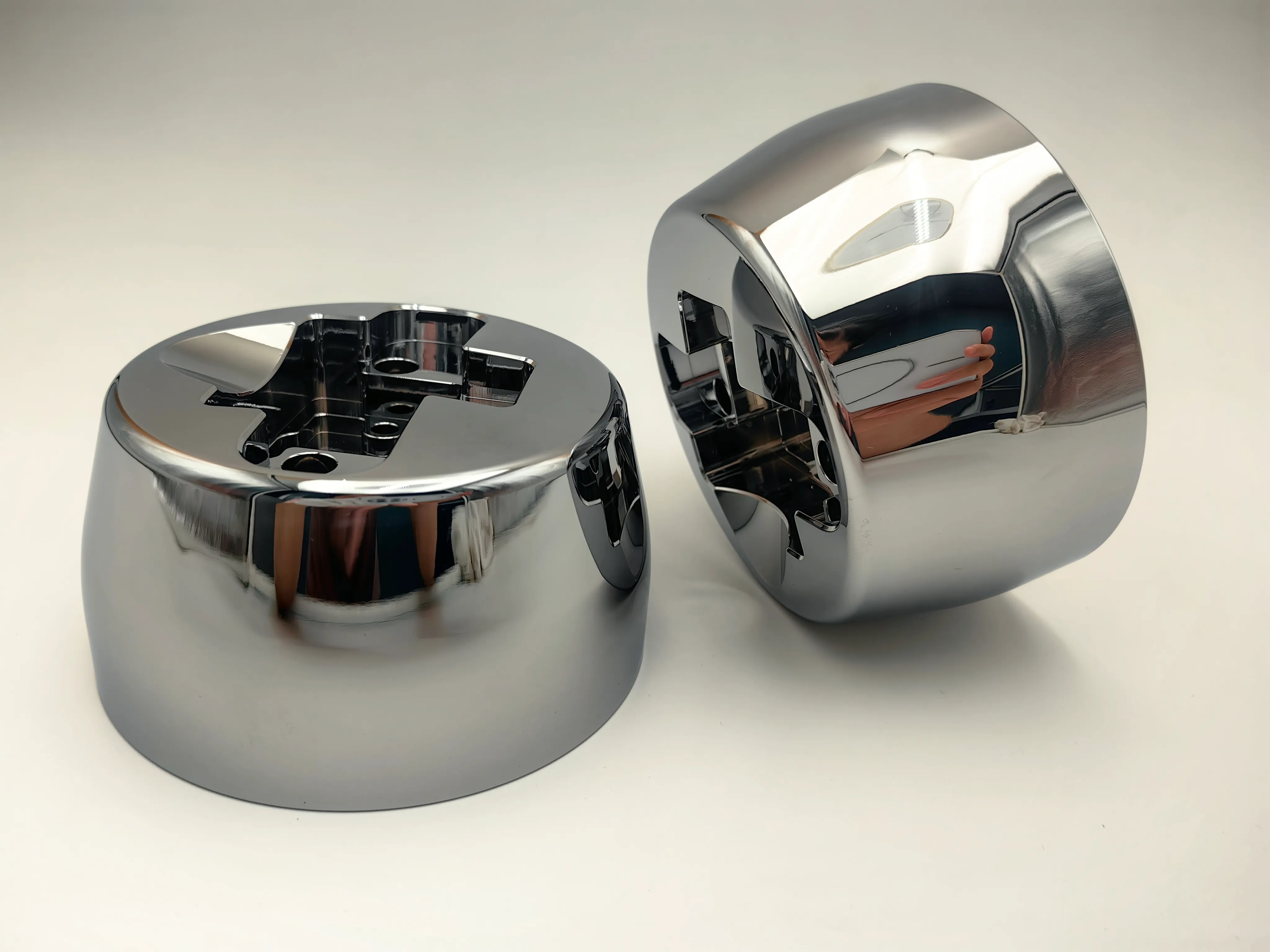 Detail view of CNC-machined 6061 aluminum coffee machine components with mirror chrome surface