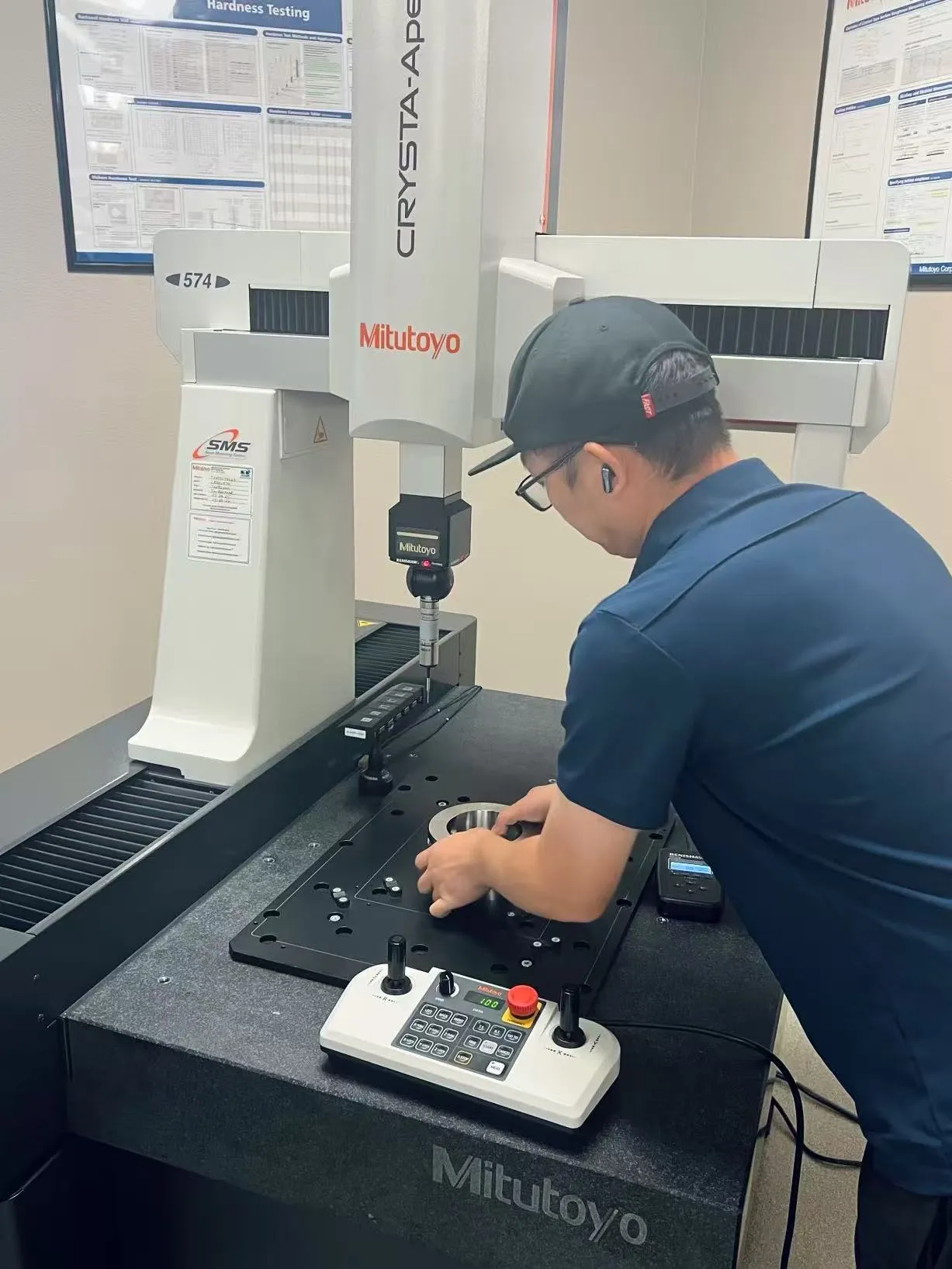 Quality Engineer at Work on Mitutoyo CMM