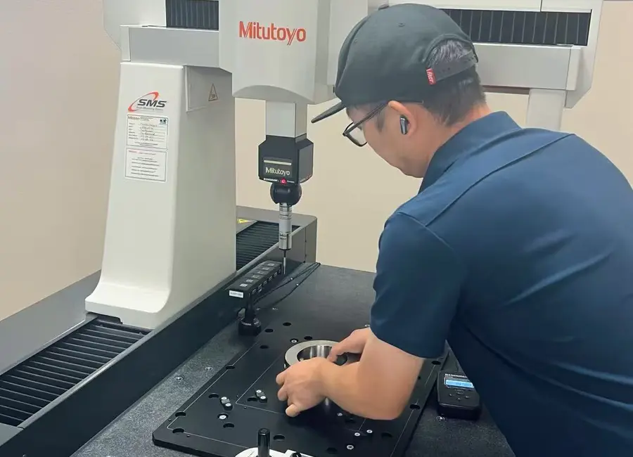 Huade engineer reviewing CNC manufacturing requirements