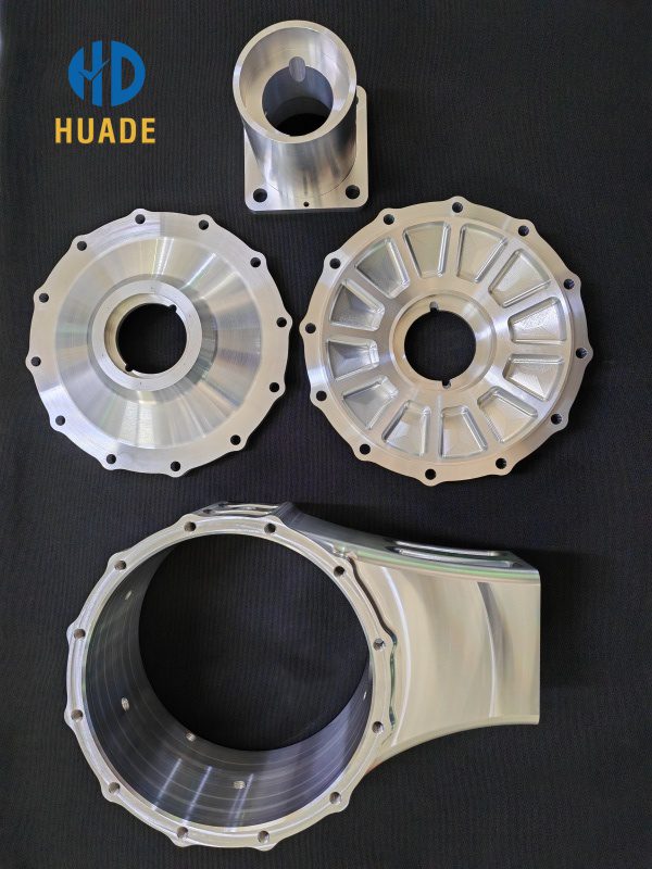 Precision CNC machining services for automotive aluminum hub rings and brake housings.