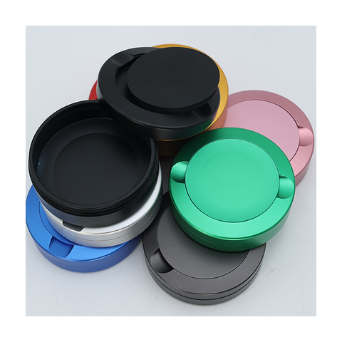 Colorful CNC-machined metal snuff box, snuff cans and cigarette tins stacked together, showcasing precision-made aluminum containers.