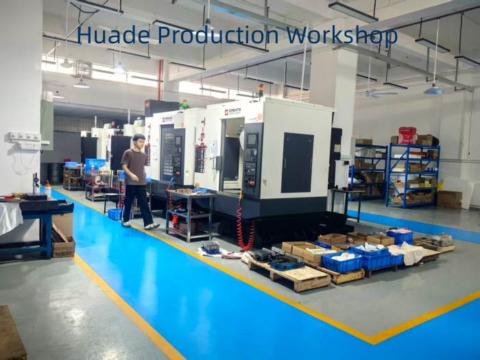 Huade Precision production workshop with advanced CNC machines and workers in a modern Dongguan CNC factory, showcasing precision manufacturing processes.