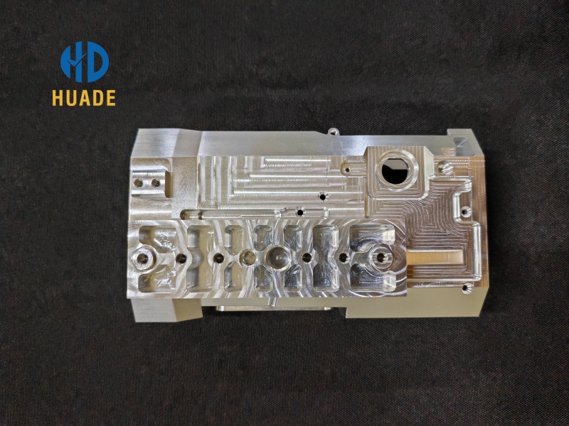 Coordinate Measuring Machine (CMM) inspecting precision CNC components for quality assurance