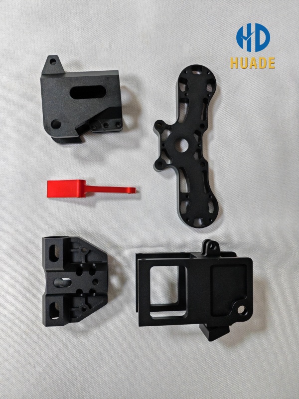 Custom drone replacement parts including motor mounts and arm braces