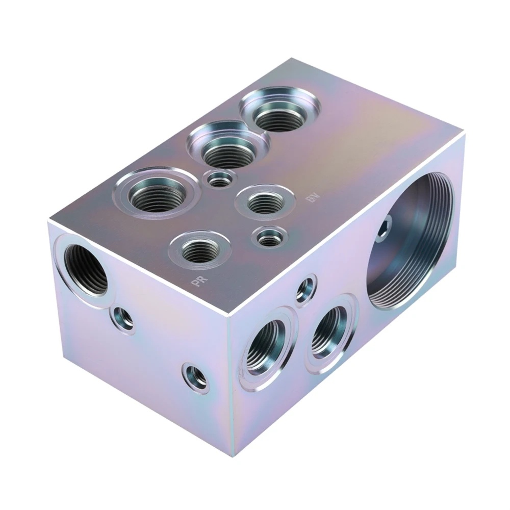 High-pressure manifold block design with optimized internal porting for hydraulic systems.