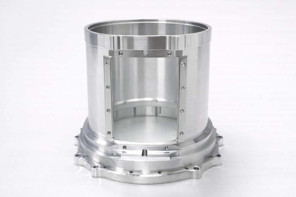 precision CNC machined aluminum aerospace housing with tight dimensional tolerances